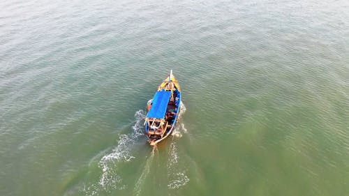 Aerial Footage Of A Fishing Boat In The Sea
