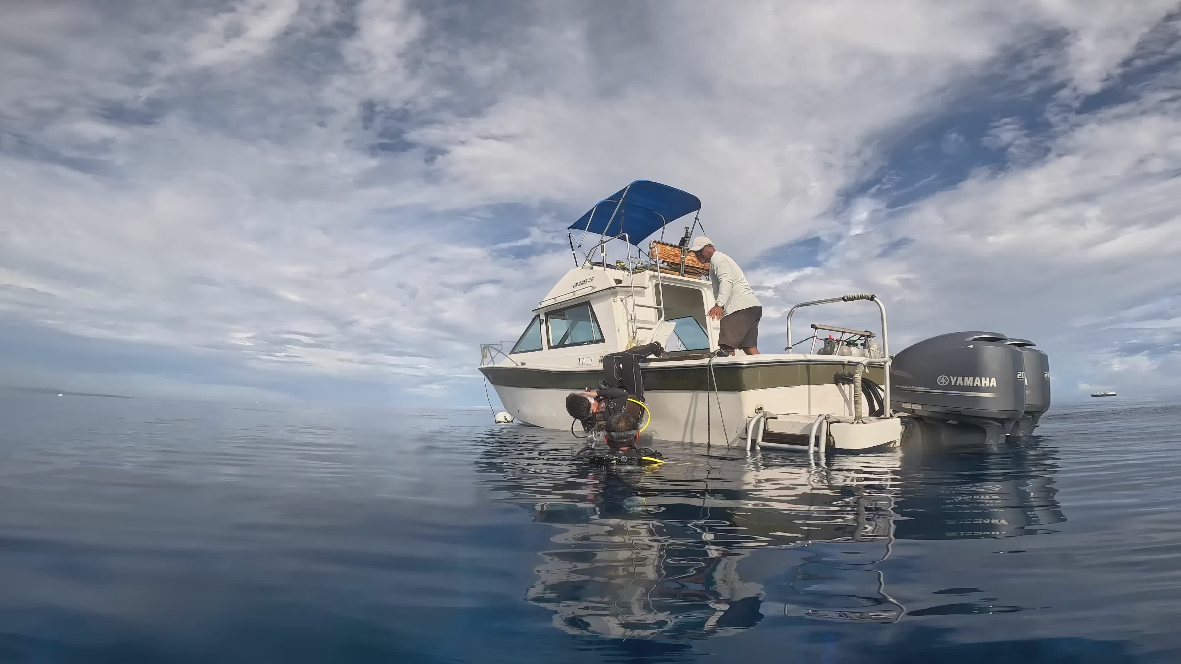 Scuba Diver Near Motorboat in Tranquil Waters Free Stock Video Footage ...