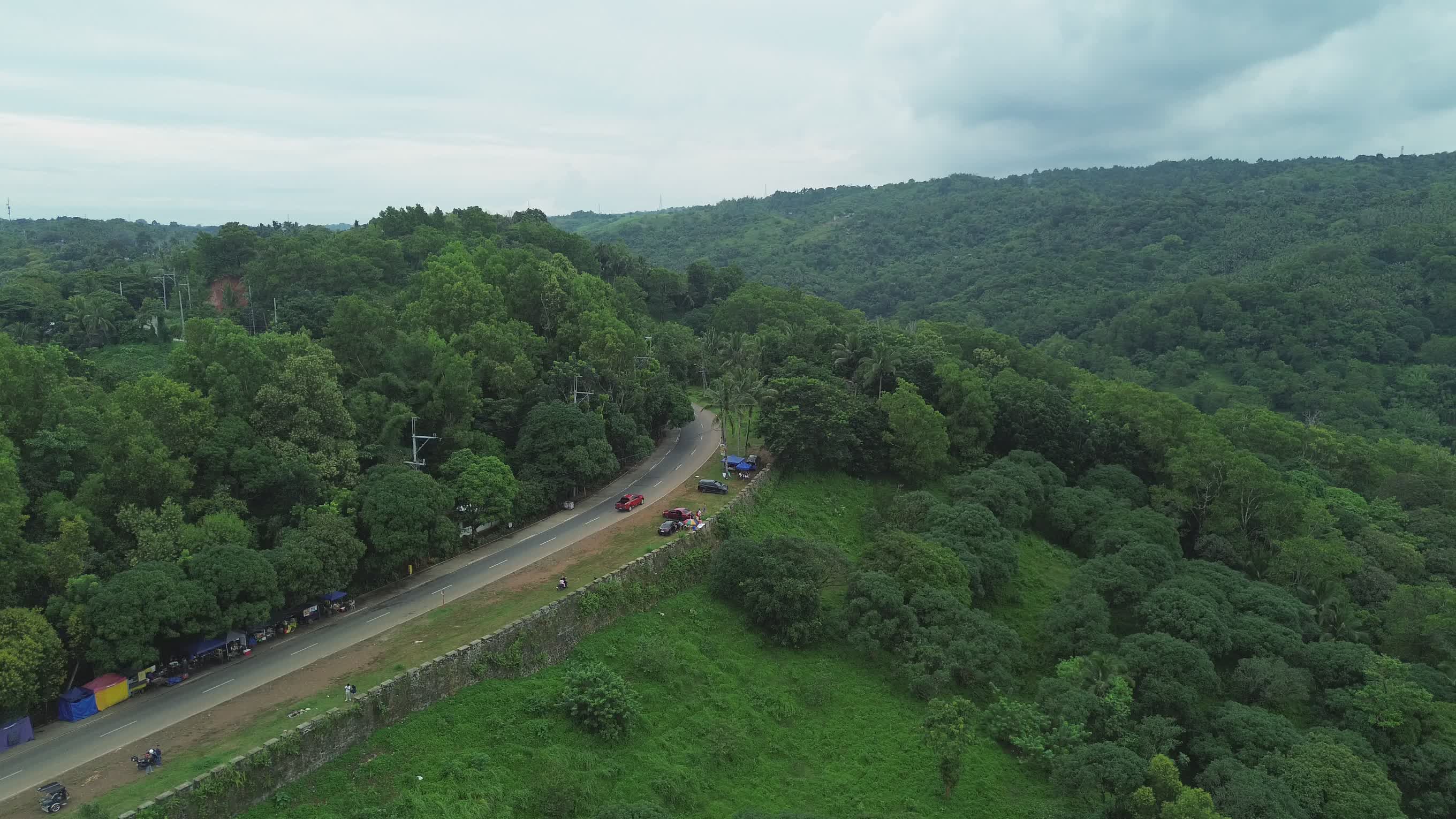 Serene Aerial View of Mountain Roadway Free Stock Video Footage ...