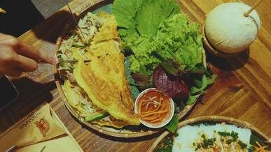 delicious vietnamese crepe served with fresh vegetables