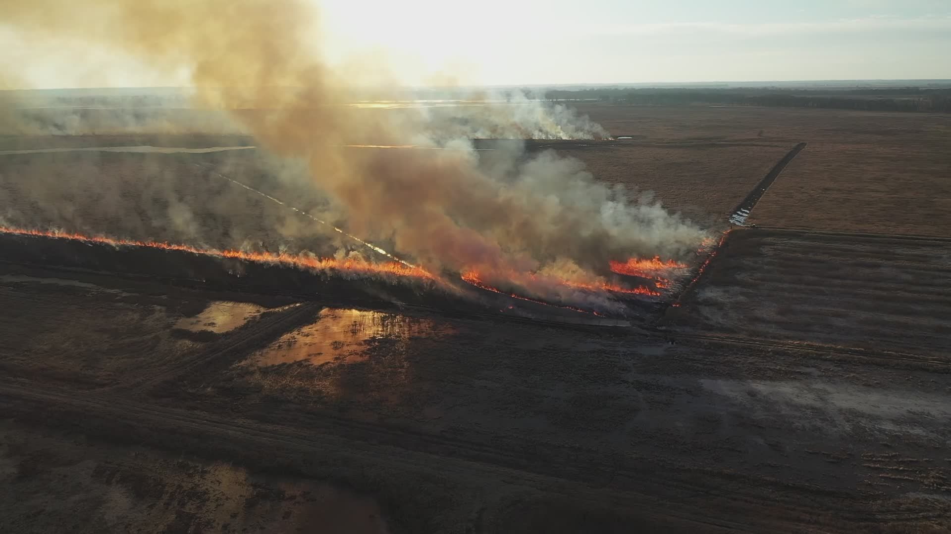 Aerial View of Controlled Field Burn in Open Landscape Free Stock Video ...