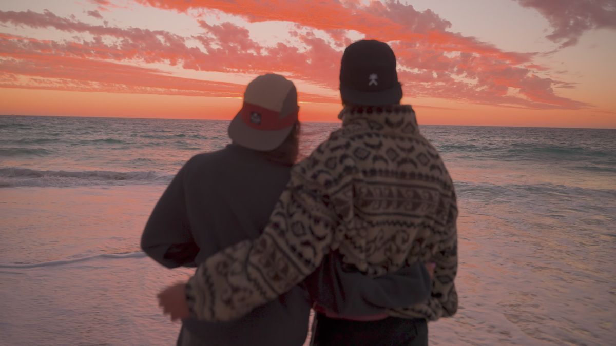 Serene Sunset Beach Stroll with Warm Smiles Free Stock Video Footage ...