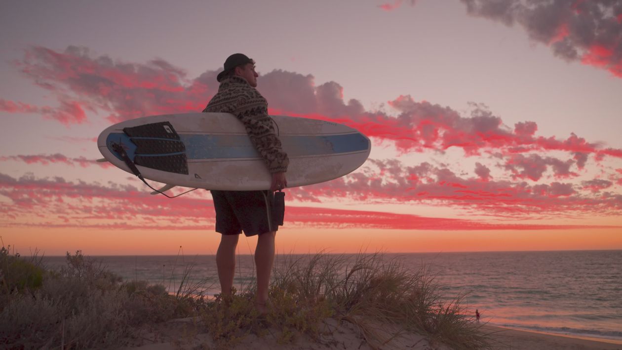 Surfer at Sunset on Tranquil Beach Free Stock Video Footage, Royalty ...