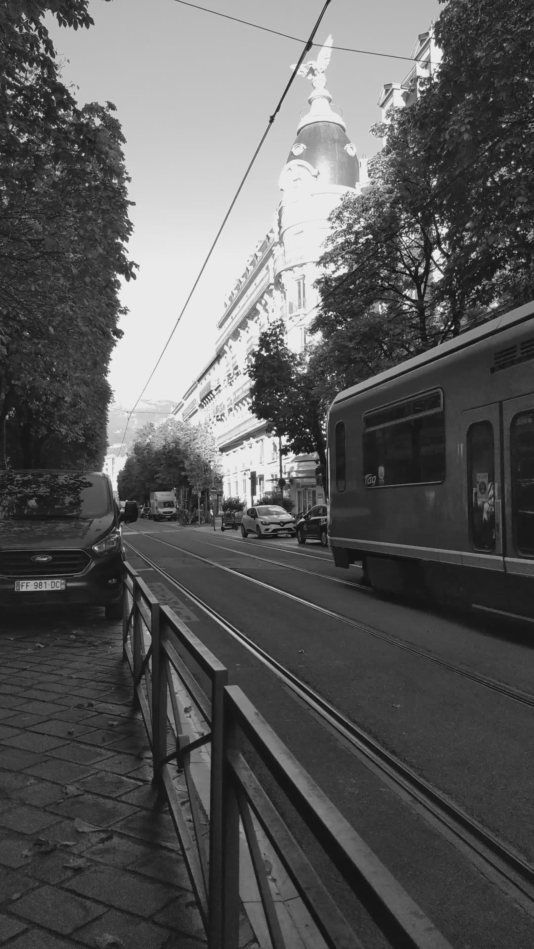 black and white city tram passing street scene 36161126 — free pexels stock footage