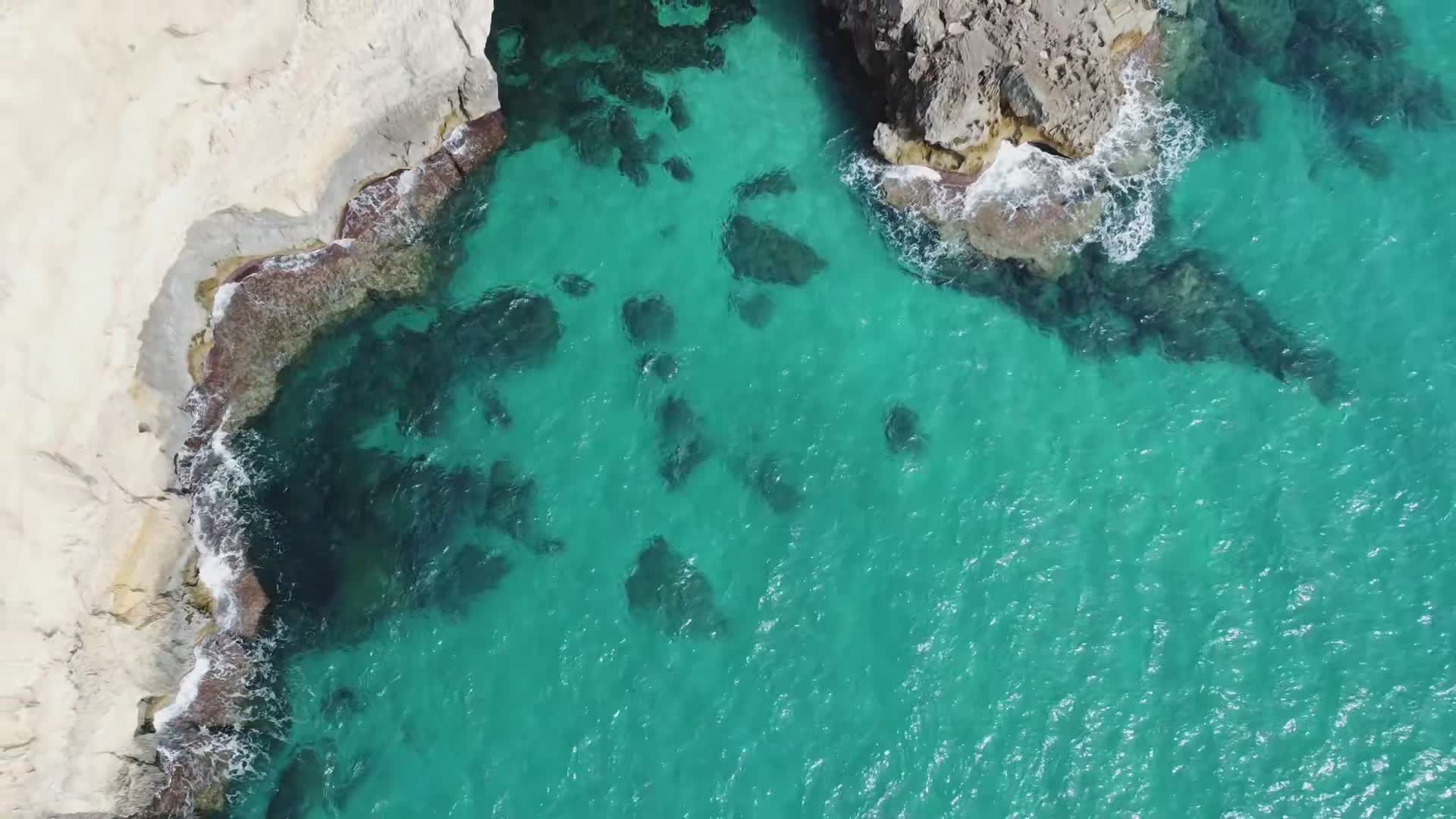 Aerial View of Rocky Coast and Turquoise Sea Free Stock Video Footage ...
