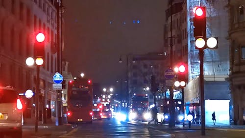 Motor Vehicles Traffic At Night In London Streets