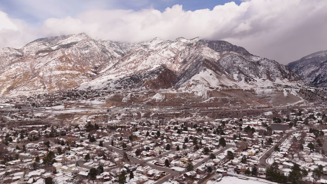 Aerial View of Snowy Mountain Town in Winter Free Stock Video Footage ...