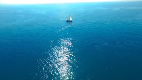 A Sailboat Out In The Open Sea
