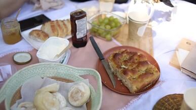 inviting outdoor picnic with various breads