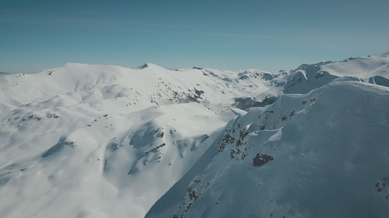 Aerial Drone View of Snow-Capped Mountain Range Free Stock Video ...