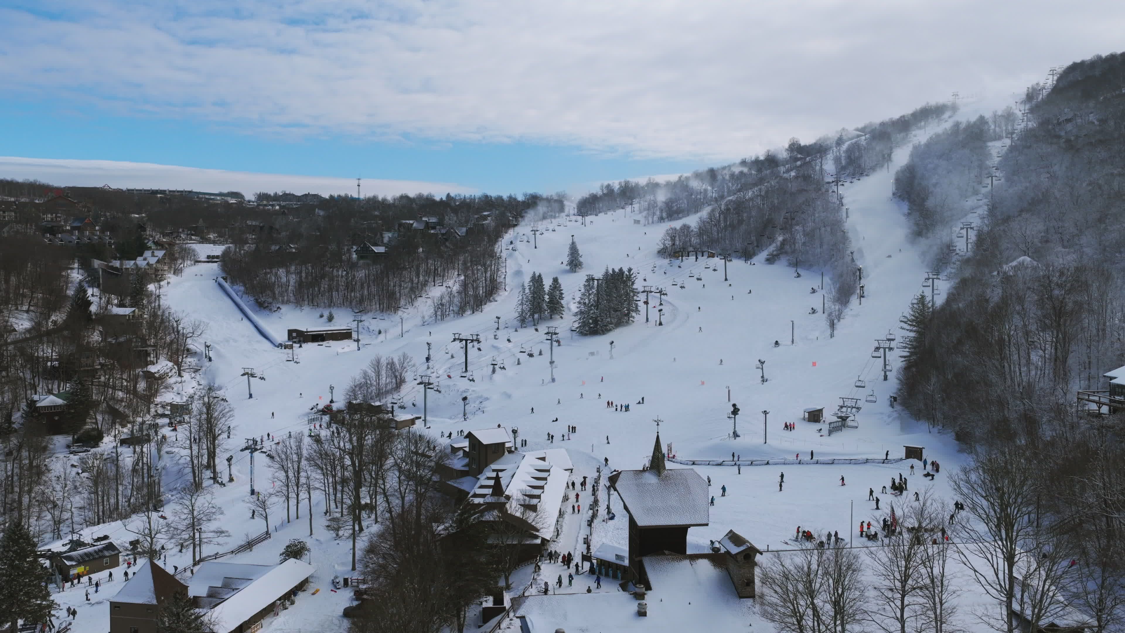 Aerial View of Snowy Ski Resort Activities Free Stock Video Footage ...