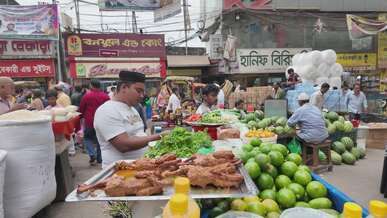 bustling outdoor market with fresh produce display