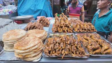 street food market with tasty fried snacks