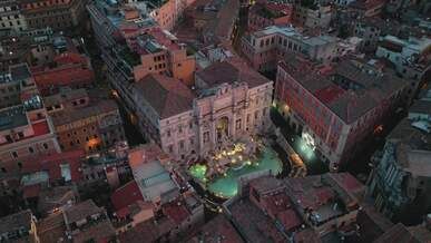 aerial view of trevi fountain in rome at dusk