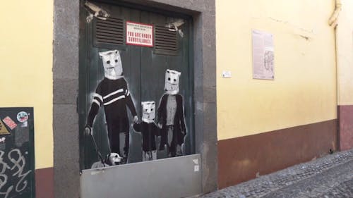 Illusion Painting On The Door Of A Building With Notice