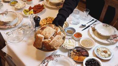 elegant dining table with various delicious dishes