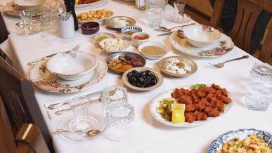elegant dinner table with diverse dishes