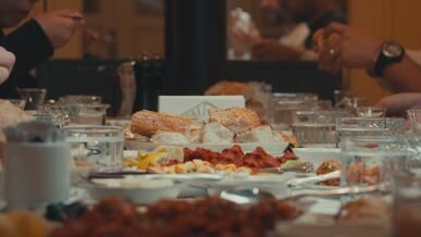 traditional ramadan iftar gathering at dinner table