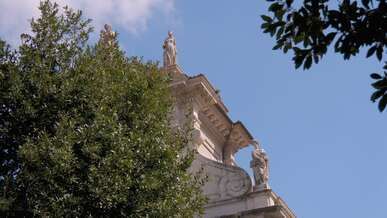 historic roman architecture among trees