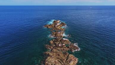 drone view of rocky coastal formation
