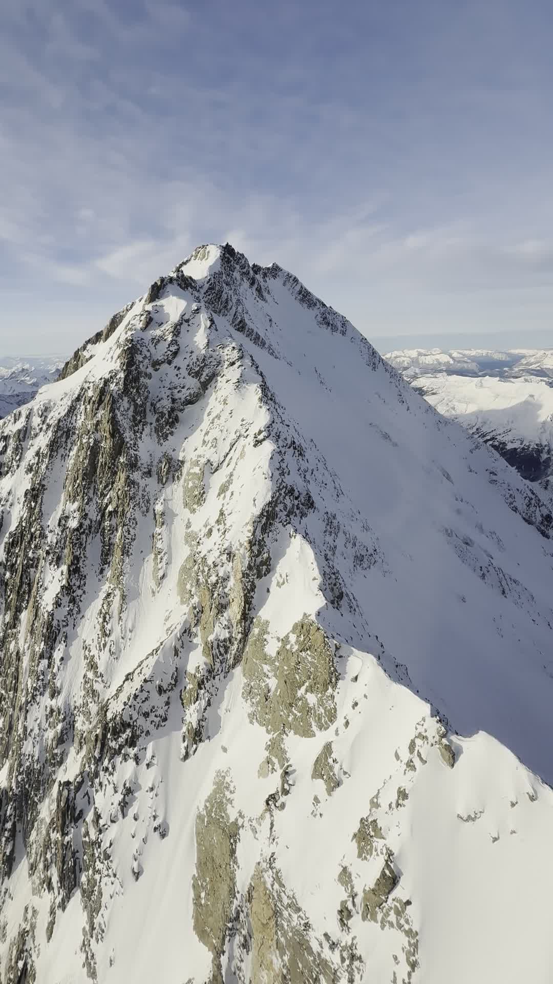 aerial view of snowy mountain peaks in winter 36707652 — free pexels stock footage