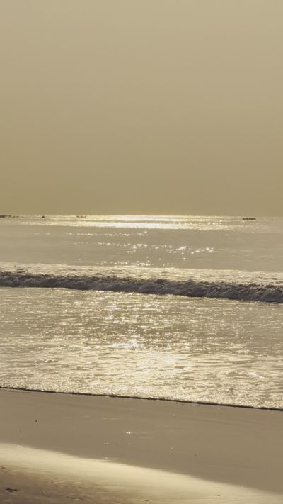 Surya Ganesh's ocean waves sunset video