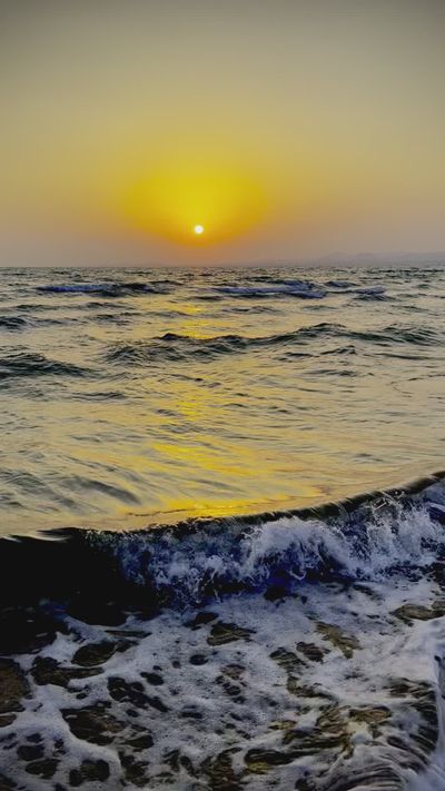 Oksana Shchegolkova's ocean waves sunset video