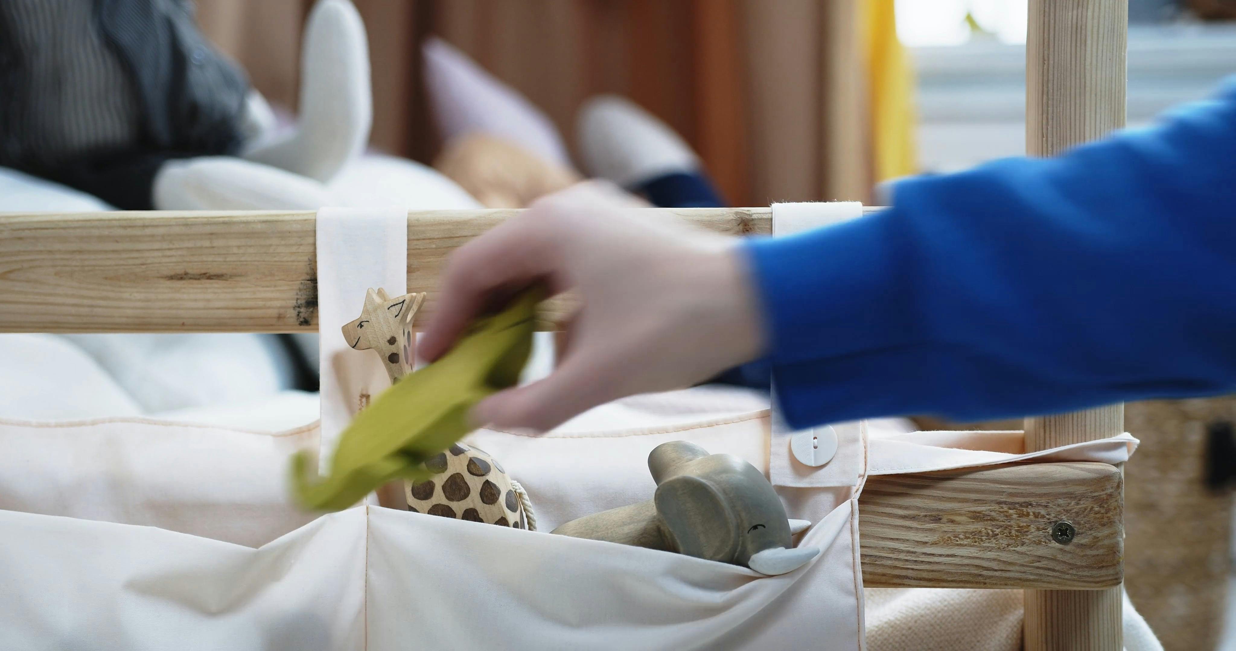 Keeping Toy Animals On A Cloth Pocket Bags · Free Stock Video