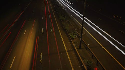 Time Lapse Footage Of The High Way With Vehicle Light Tracks
