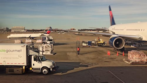 An Airplane On The Airport Apron Getting Ready In Loading Supplies And Final Check And Maintenance