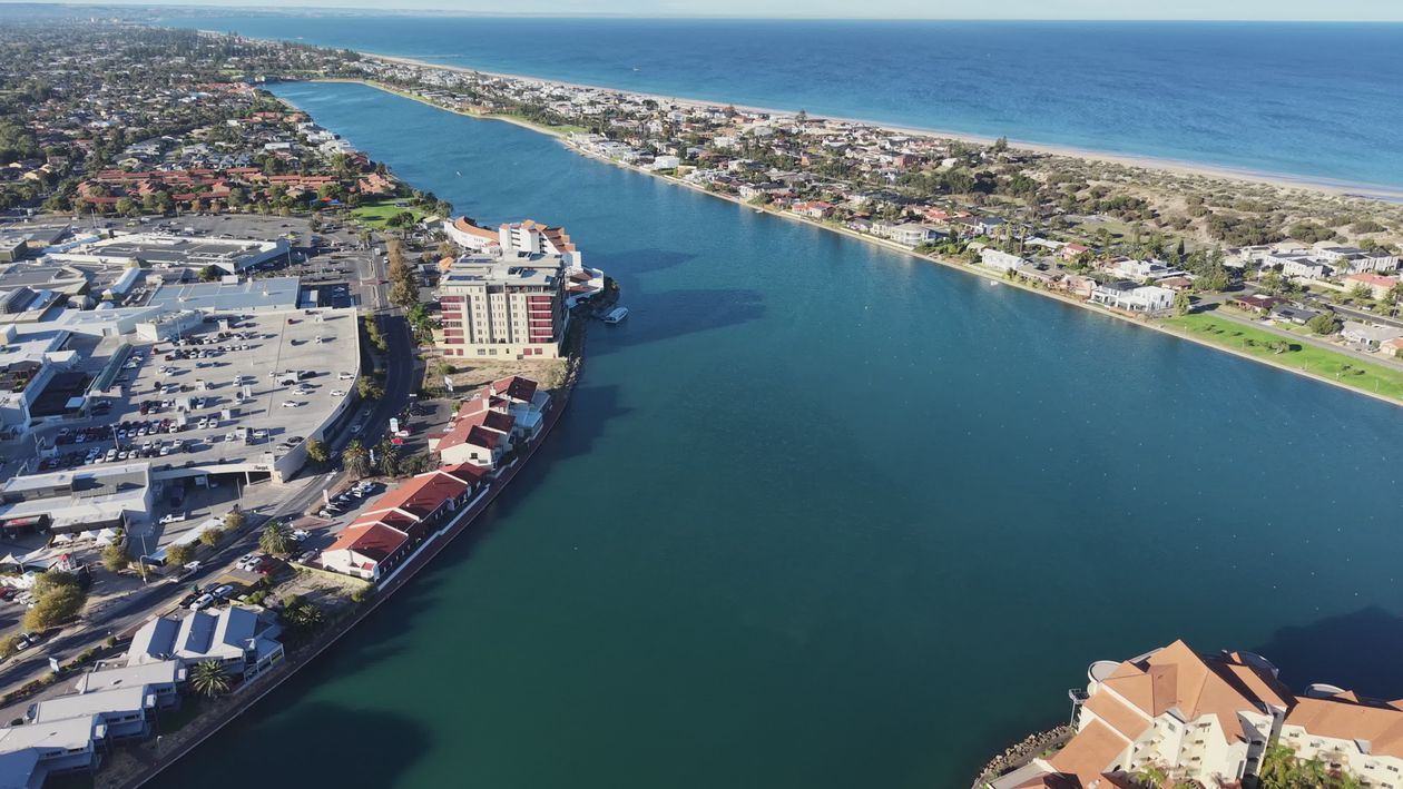 Aerial View of Coastal City with River and Buildings Free Stock Video ...