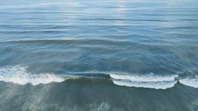 serene aerial view of ocean waves