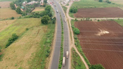 A Highway In The Middle Of An Agricultural Land, 