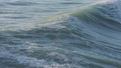 majestic ocean waves crashing on rocky coast