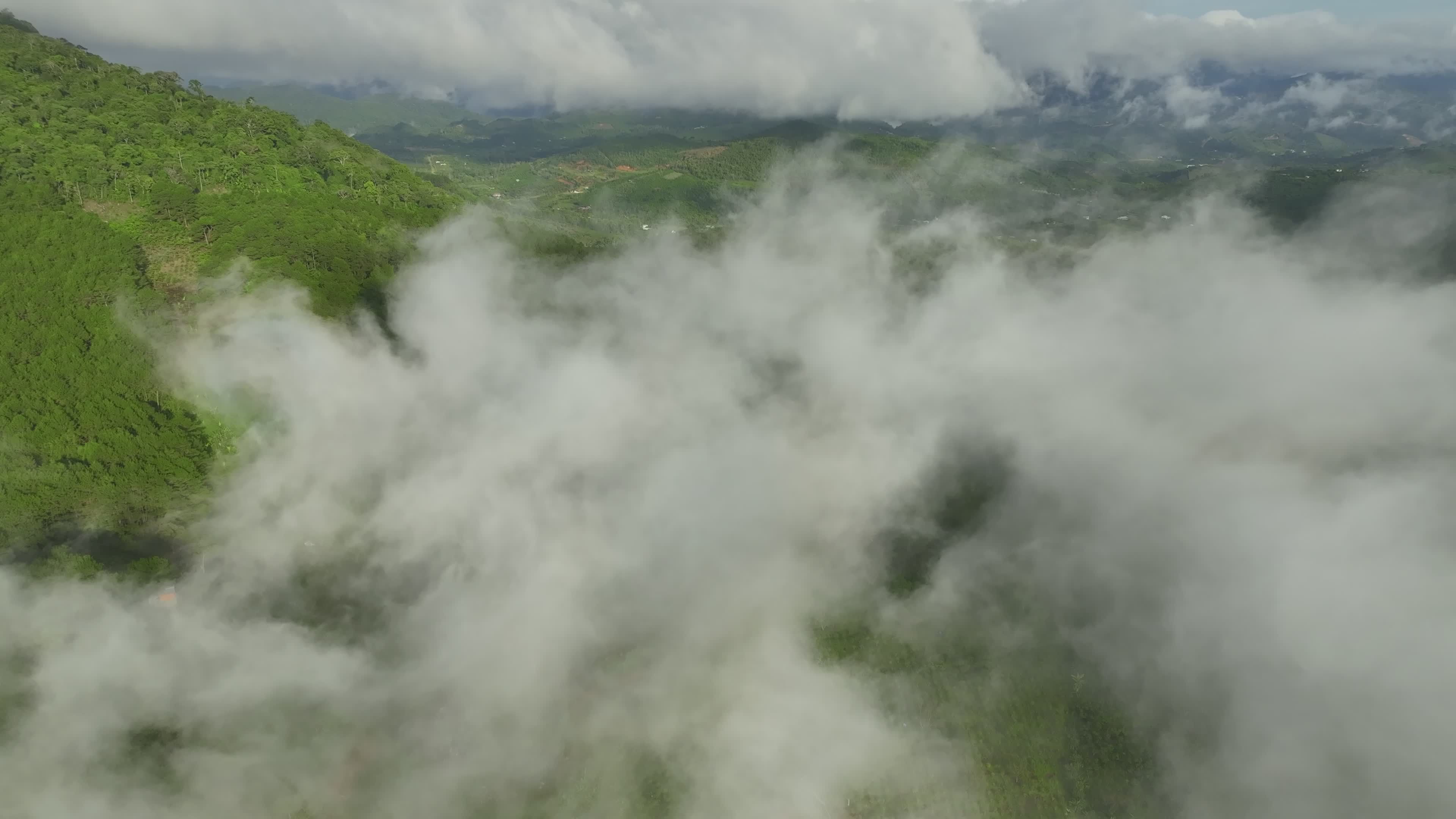 Aerial View of Lush Green Mountains and Clouds Free Stock Video Footage ...