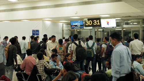 People Waiting At The Airport 