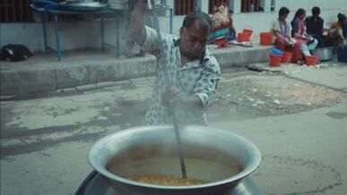 street food cooking in outdoor market