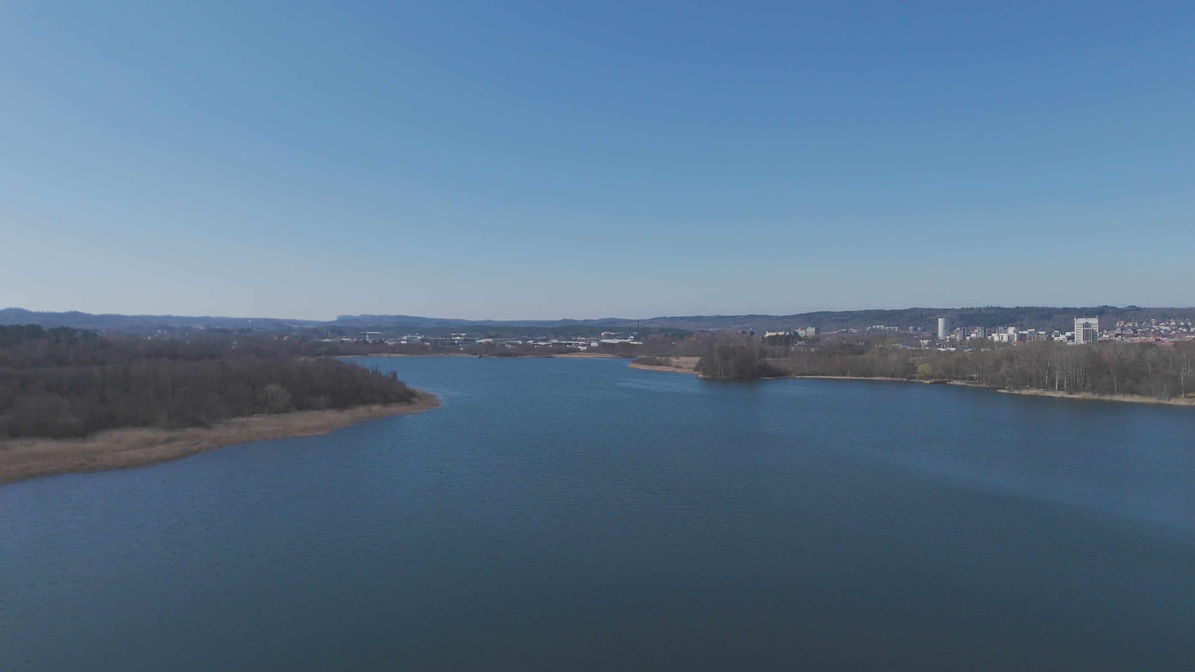 Aerial View of Serene Lake and Surrounding Landscape Free Stock Video ...