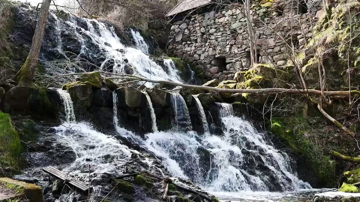 Rustic Stone Waterfall Majestic Waterfall by Rustic Stone Building Free Stock Video Footage ...