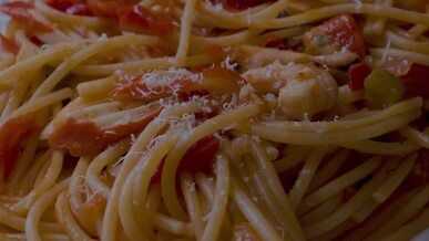 delicious spaghetti with marinara sauce close up