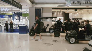security patrol in busy airport terminal