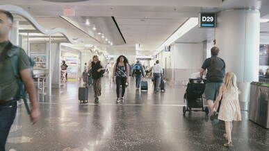 busy airport terminal with diverse travelers
