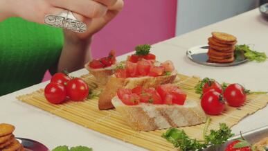 preparing bruschetta with fresh ingredients