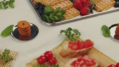 delicious breakfast spread with waffles and fruit