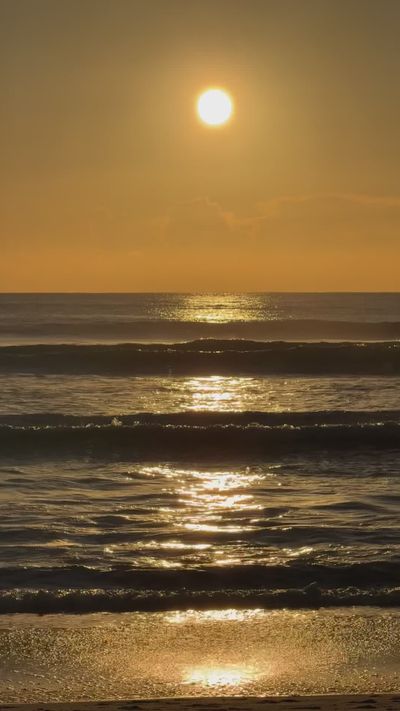 Rachel Roy's ocean waves sunset video