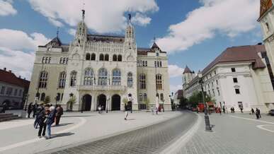 historic european city square with e bike riders