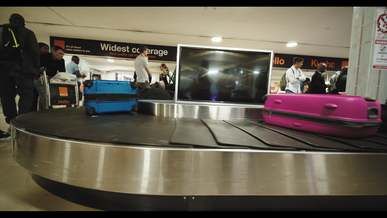 bags on a baggage carousel