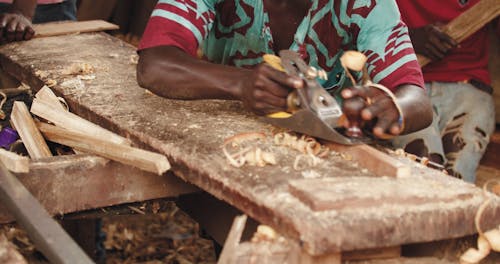 Footage Of A Man Carving The Wood