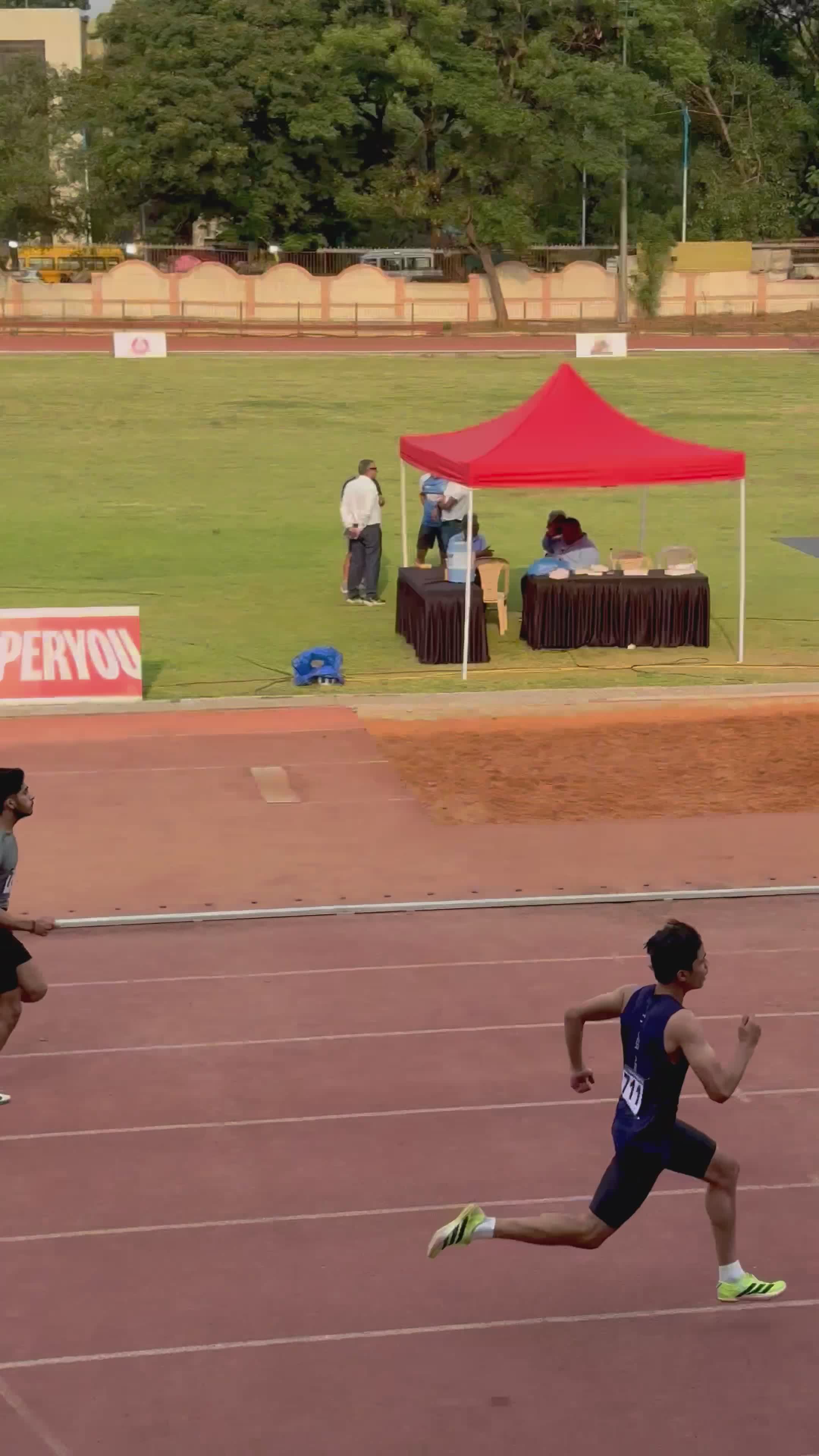 Exciting Track and Field Race at Outdoor Stadium Free Stock Video ...