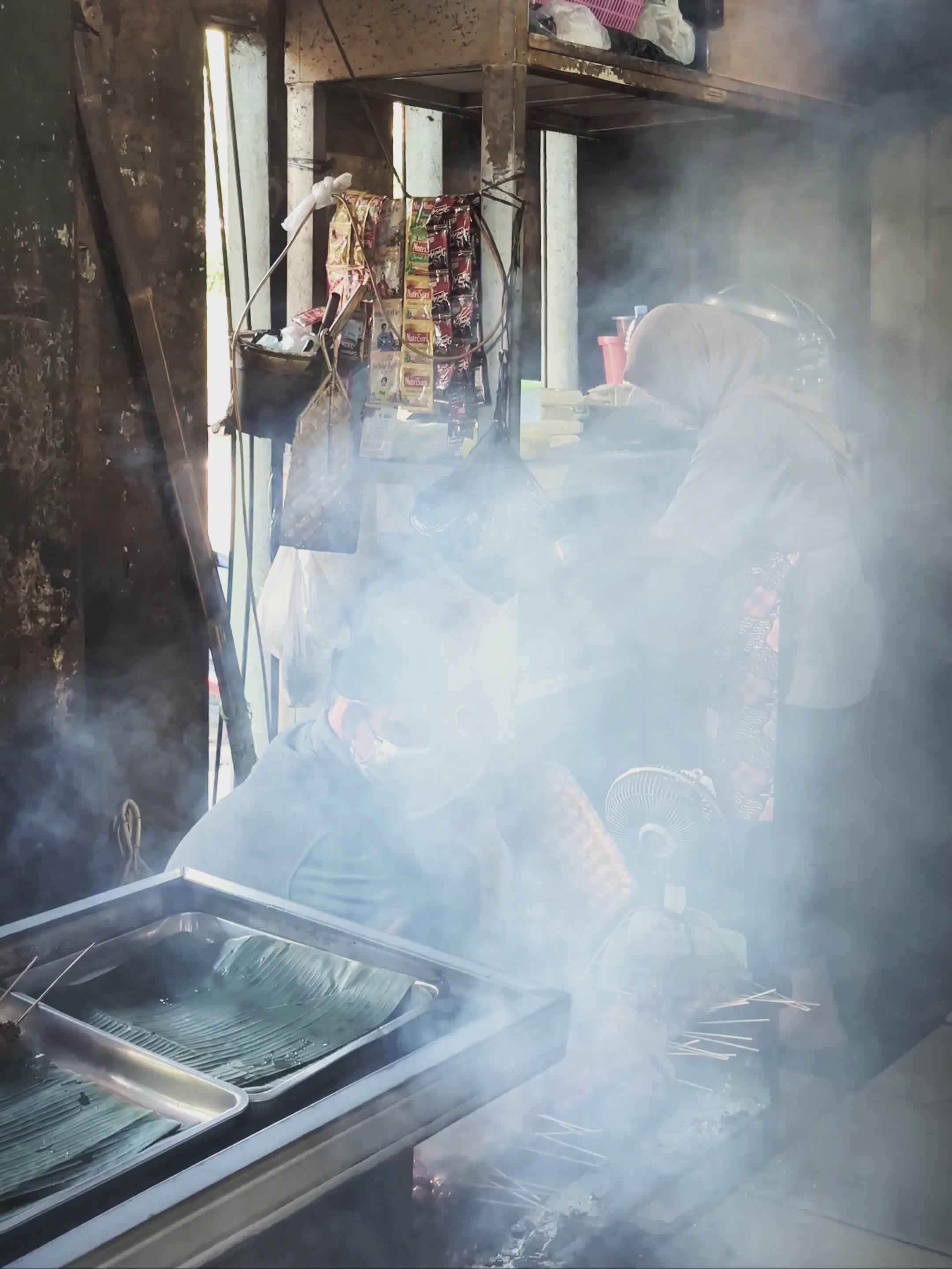street food vendor cooking skewers 37281815 — free pexels stock footage